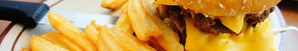 Eating American (Traditional) Burger at Little Coney restaurant in Seattle, WA.